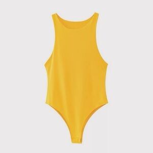 - Bodysuit
- NWT - Boutique 
- Yellow
- Available in small, medium, large